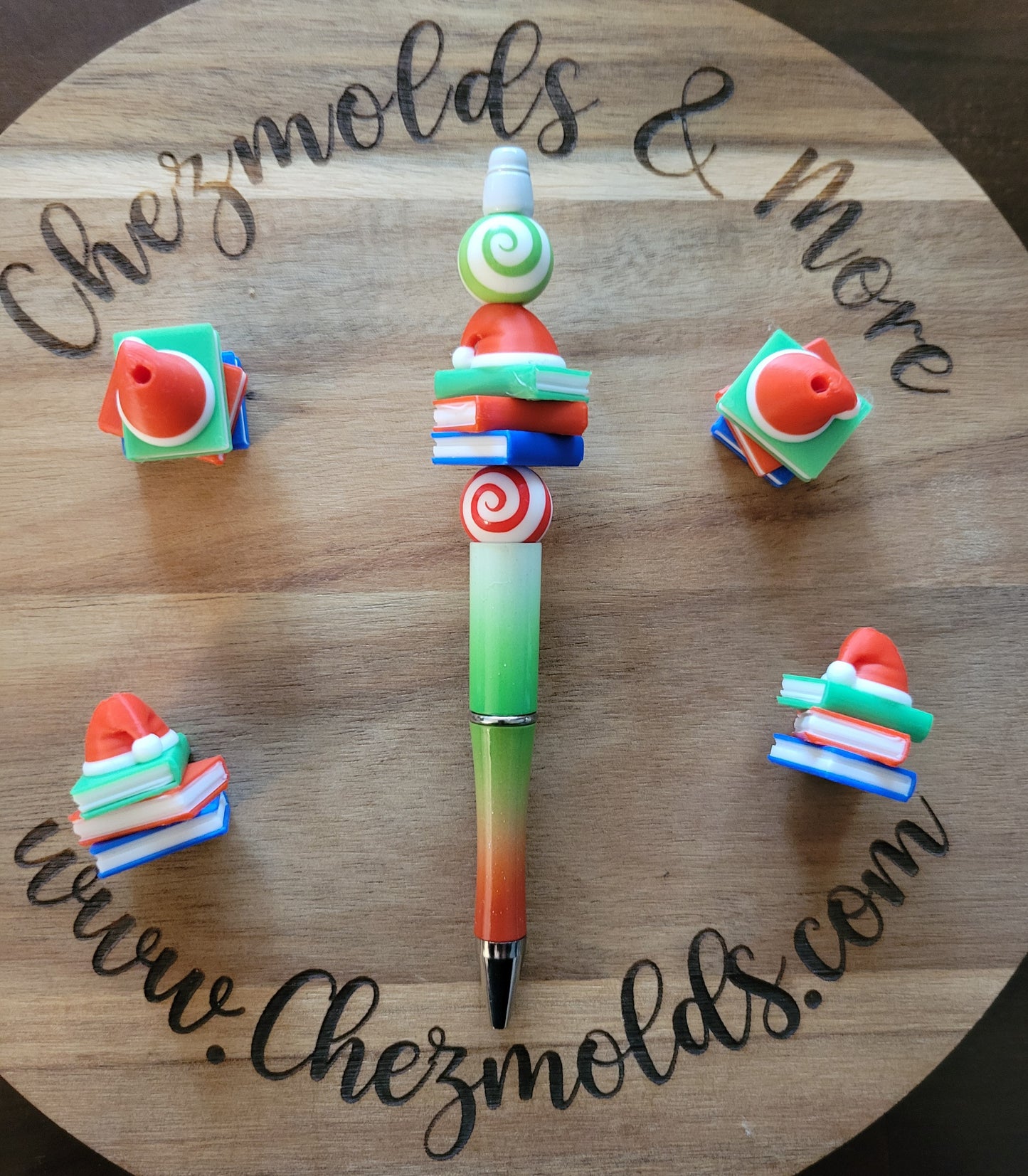 CE 3d printed santa hat on book stack - focal Bead