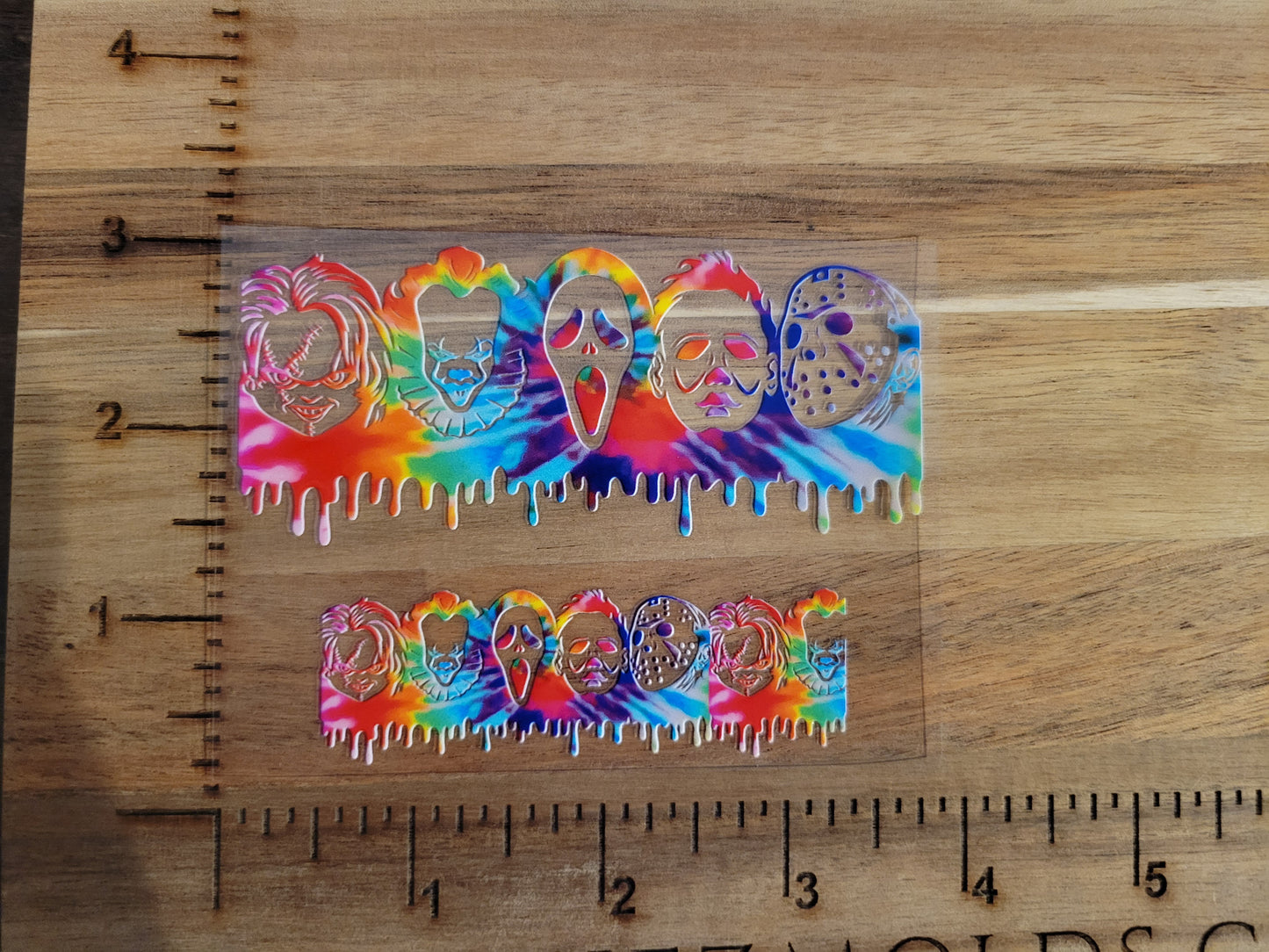 UV DTF transfer for tumbler keychain- Horror- bright rainbow faces