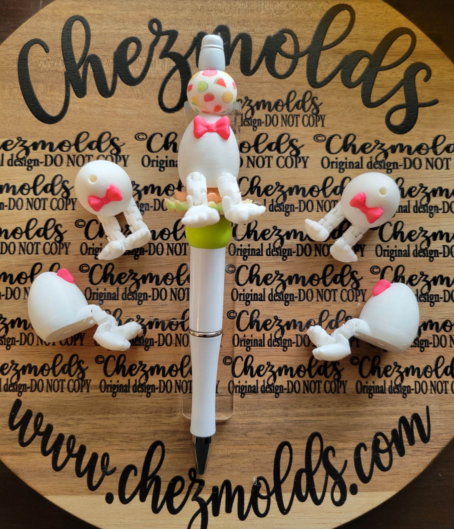 CE 3d printed focal bead-white egg with bow kicker ( flexy feet )