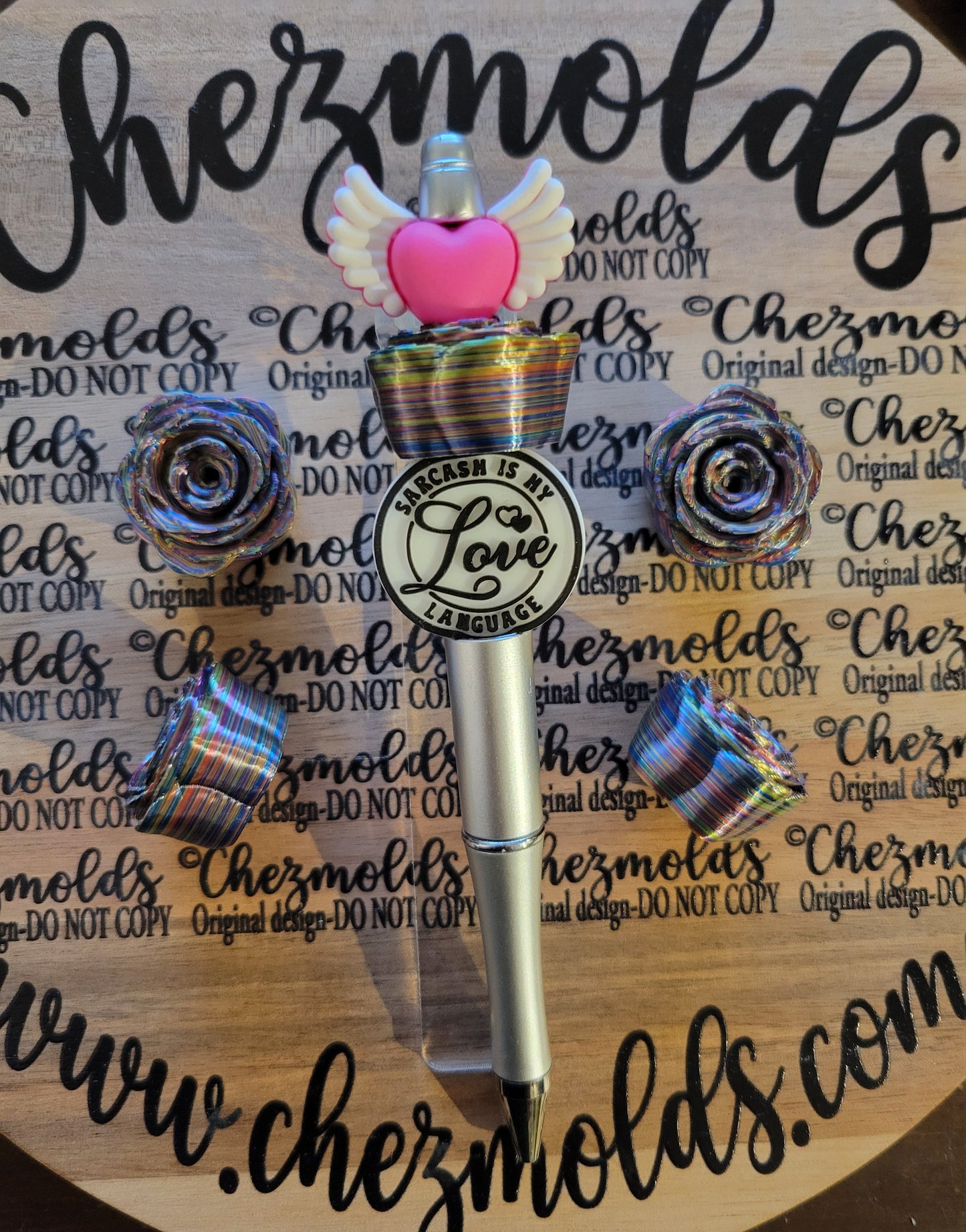 CE 3d printed focal Bead- rose spinner-  chrome rainbow