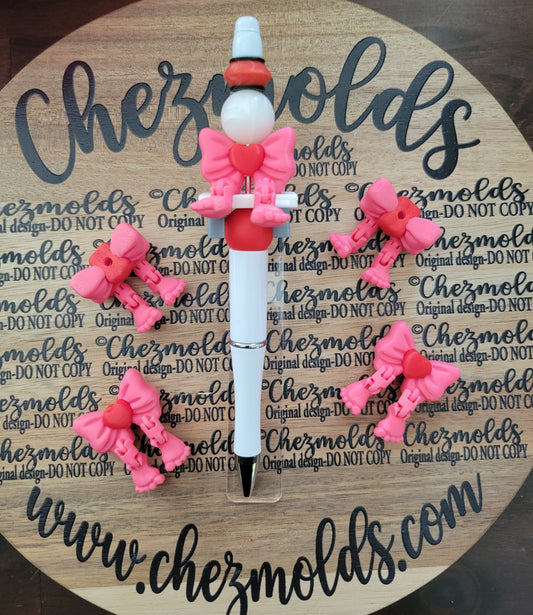 CE 3d printed focal bead- Bow  kicker ( flexy feet ) pink/red