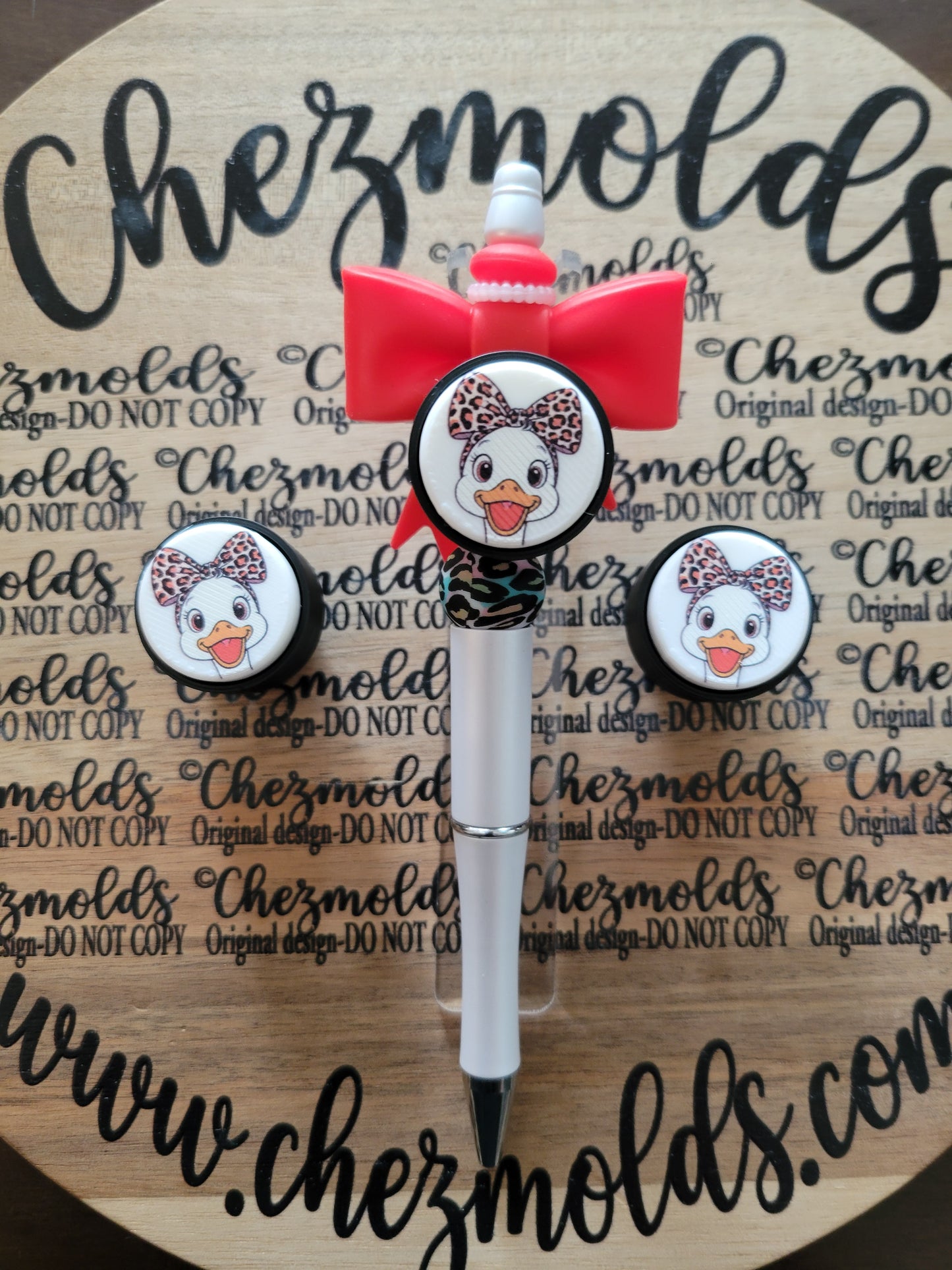 CE 3d printed Clicky button- cheetah bow goose