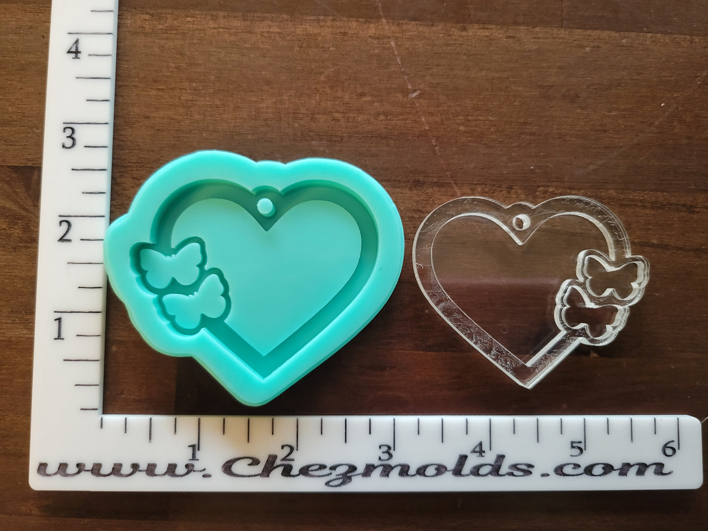 Layered heart keychain with butterfly openings